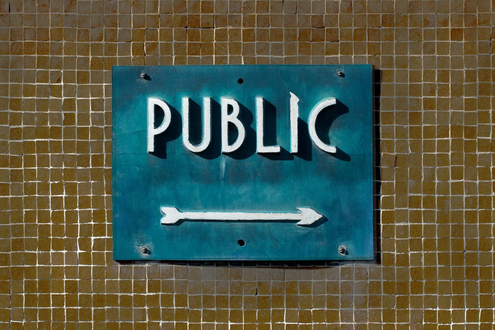 Public sign points to something.